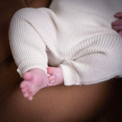 THE WOOLLY BABY JUMPSUIT - pure